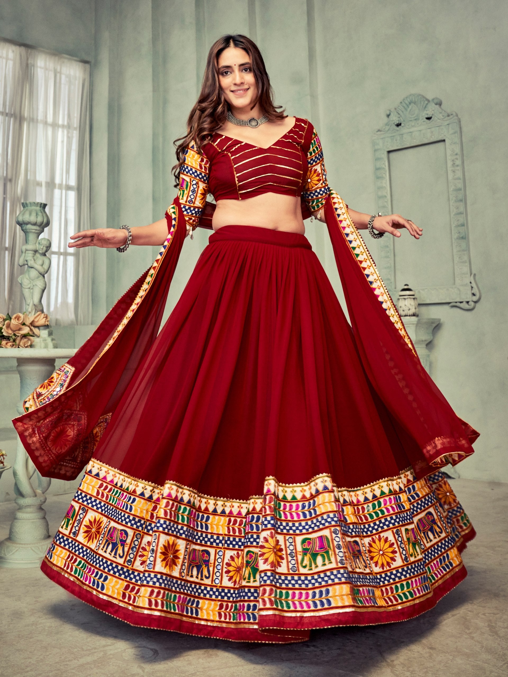 Navratri Special Dark Maroon Kutchi Embroidered Chaniya Choli with Mirror Work