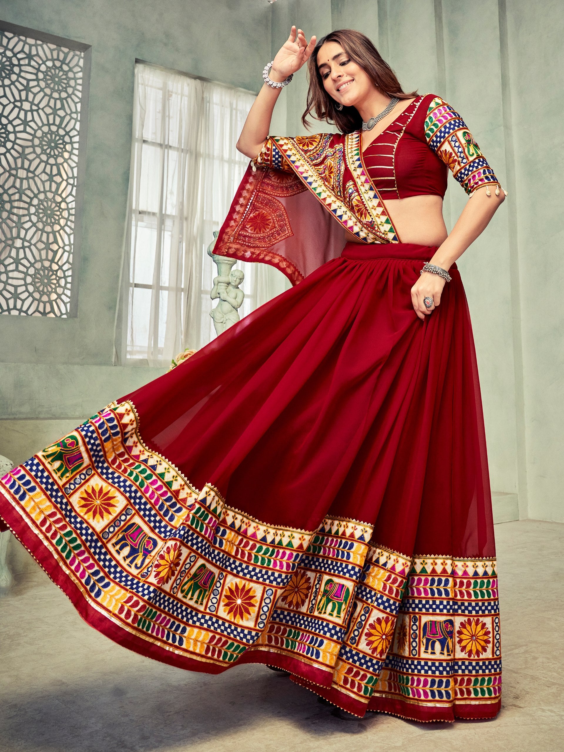 Navratri Special Dark Maroon Kutchi Embroidered Chaniya Choli with Mirror Work