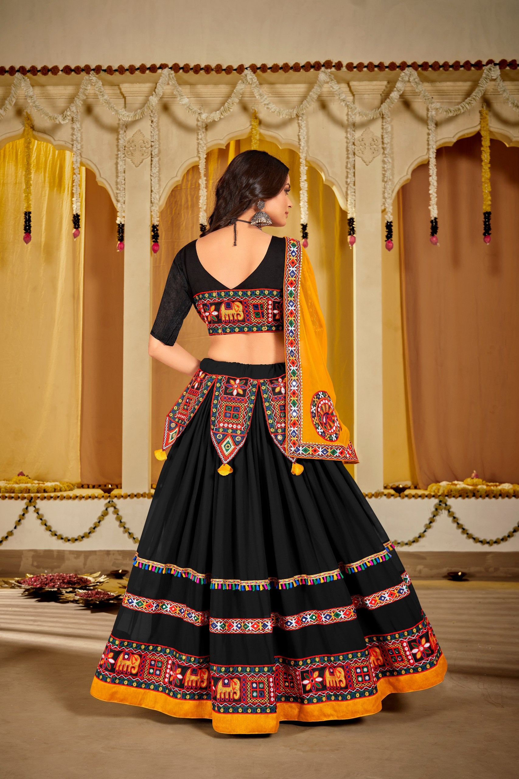 Navratri Special Black Georgette Chaniya Choli with Kutchi Embroidery and Mirror Work