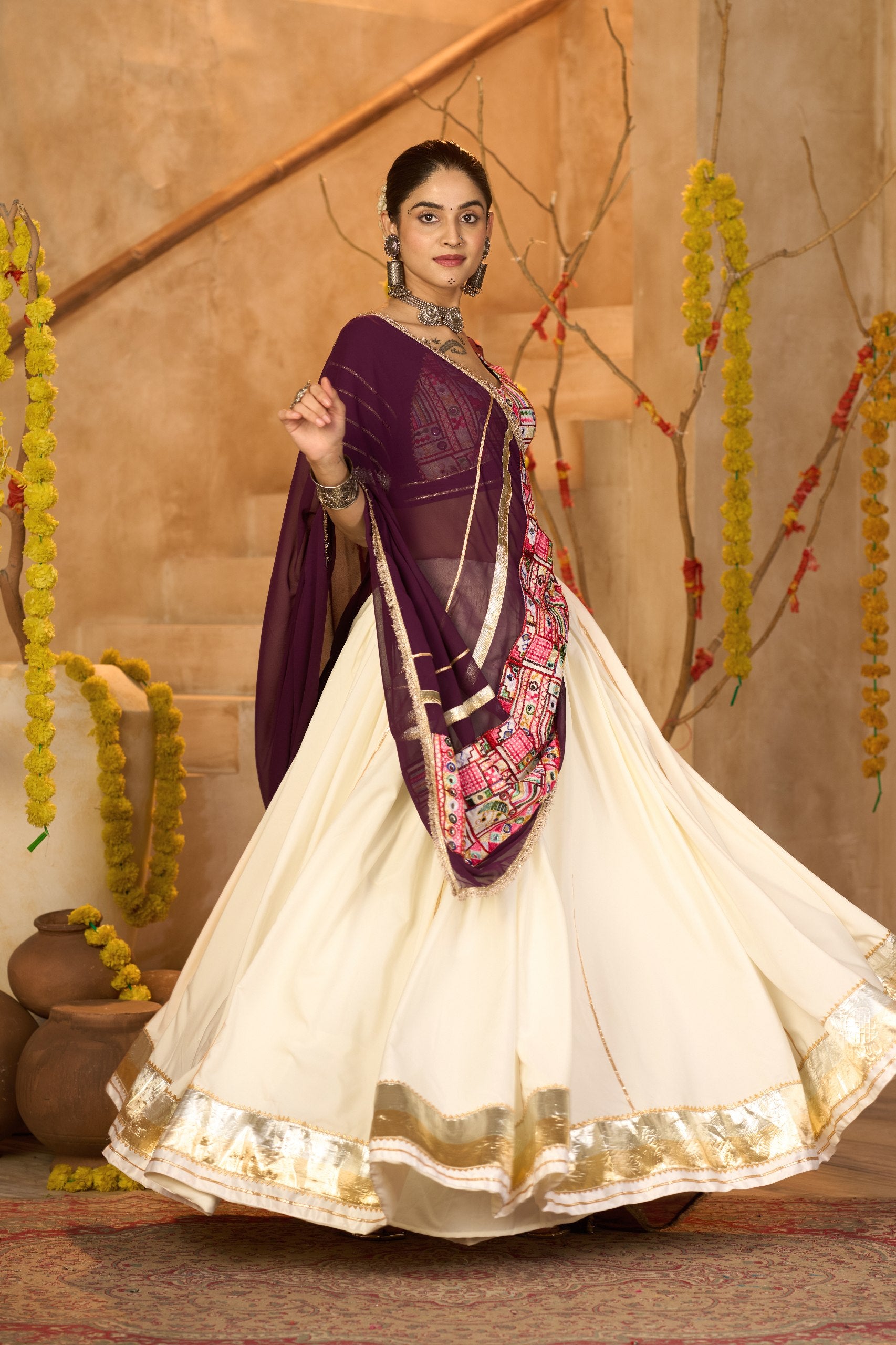 Navratri Special Off White Crepe Chaniya Choli with Gota Patti and Mirror Work