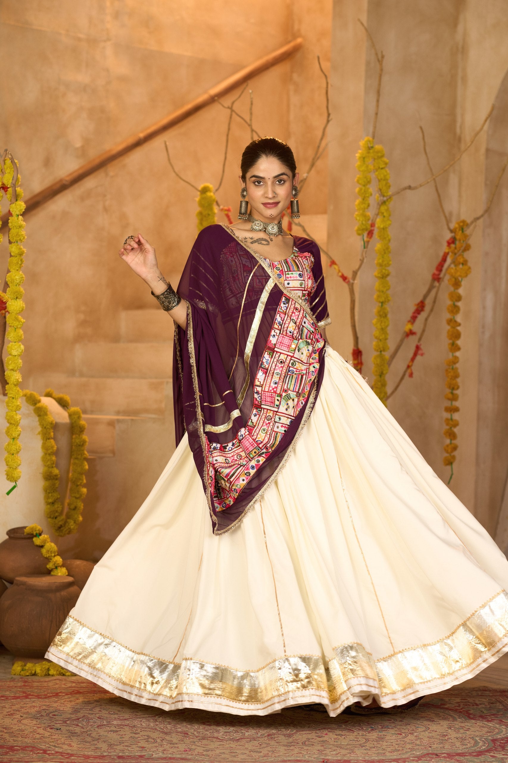 Navratri Special Off White Crepe Chaniya Choli with Gota Patti and Mirror Work