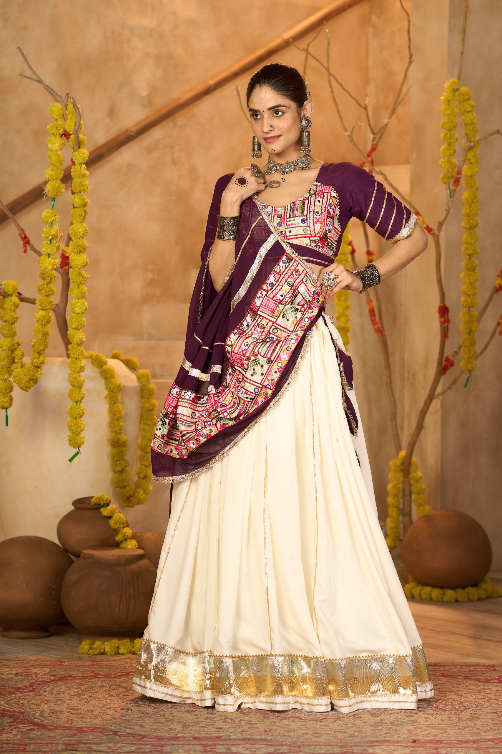 Navratri Special Off White Crepe Chaniya Choli with Gota Patti and Mirror Work